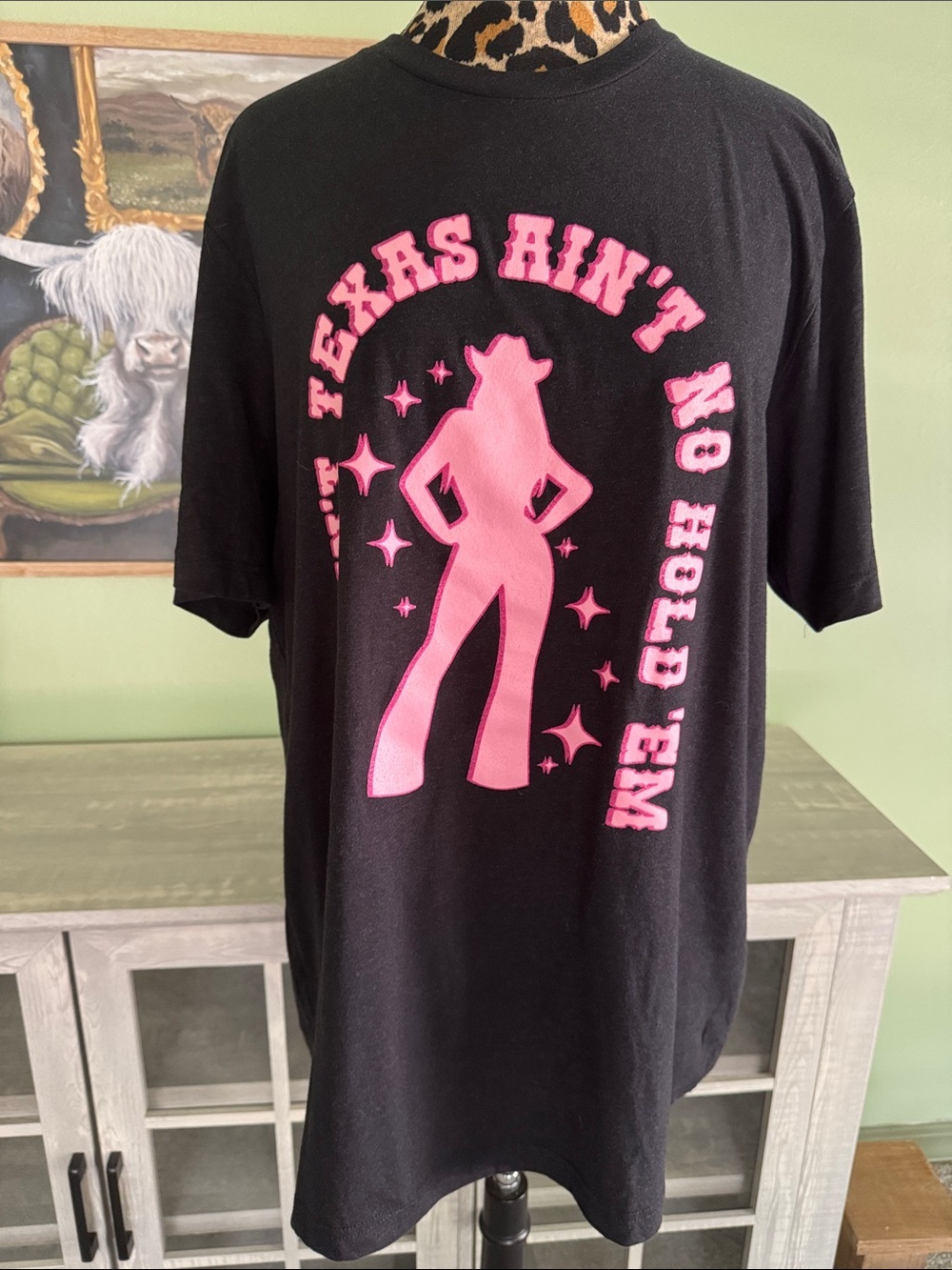 Black Tee with Pink "This Ain’t Texas Ain't No Hold 'Em" Graphic
